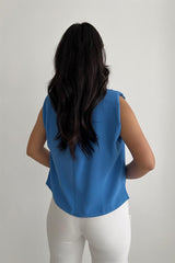 Ruffled sleeveless top