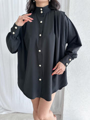 Oversized pearl buttoned shirt