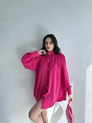 Oversized pearl buttoned shirt